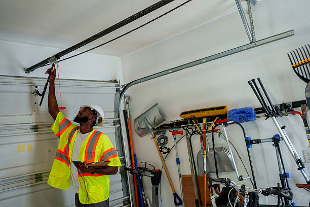 Professional Garage Door Panel Replacement technician working in Colfax, IA